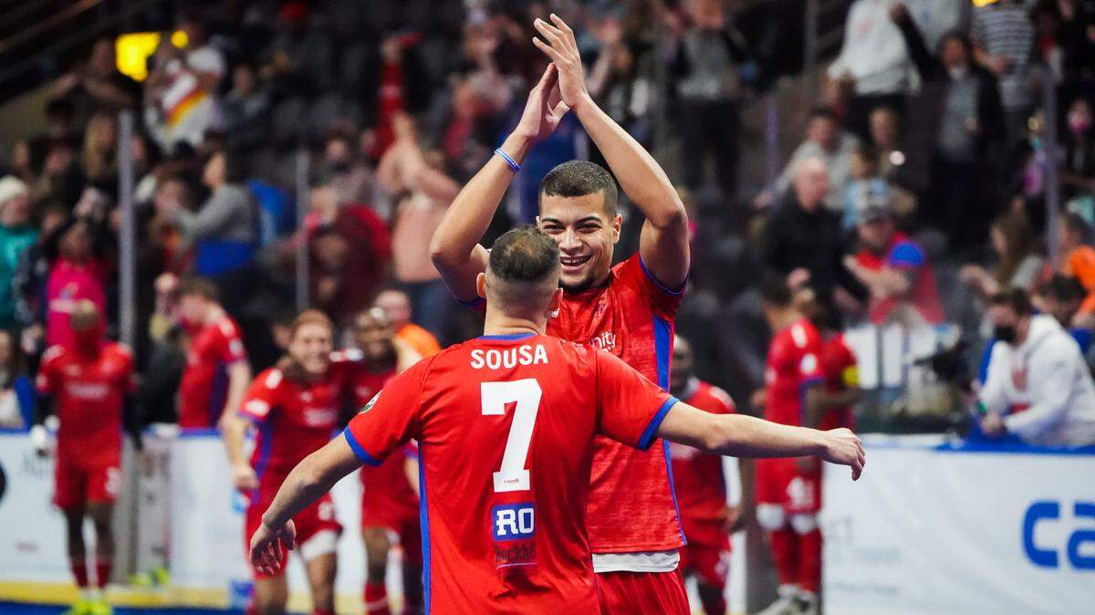 In this photo from a match earlier this season, Kansas City Comets players Rian Marques and Lucas Sousa celebrate a goal. Both men also scored Tuesday night during a playoff game against Dallas.