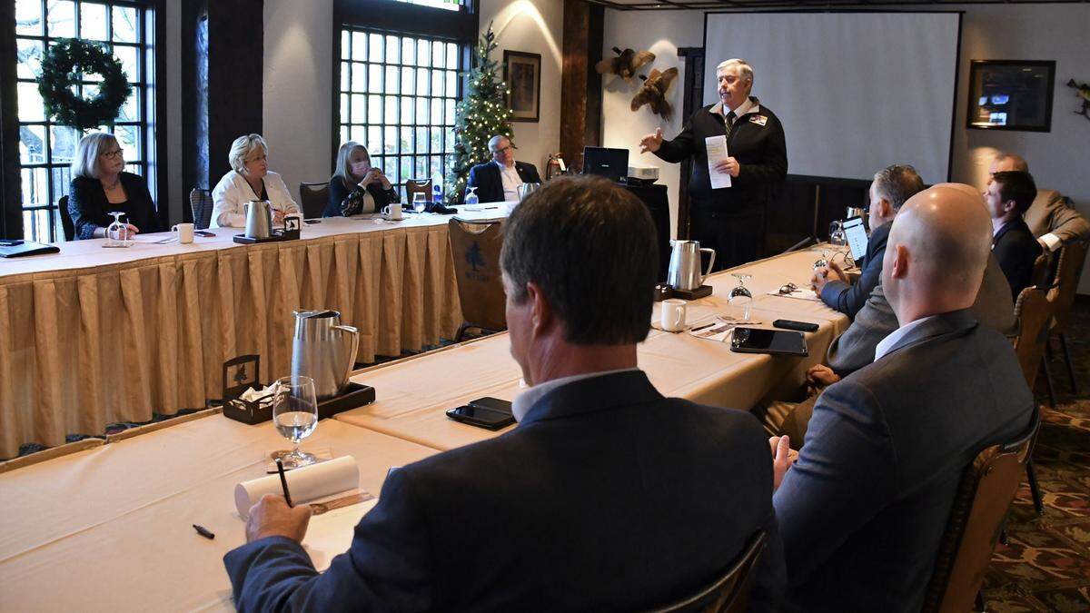 Missouri Gov. Mike Parson speaks to a Senate Republican retreat on Nov. 11. The Senate halted work on Monday after the Senate Republican leader announced COVID-19 cases among senators and staff.
