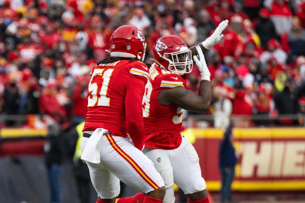 Kansas City Chiefs defensive tackle Tershawn Wharton (98) celebrates with Kansas City Chiefs defensive end Mike Danna (51) following a sack in the first half of the Chiefs AFC Divisional Round playoff game win vs. the Houston Texans on Saturday, Jan. 18, 2025, at GEHA Field at Arrowhead Stadium.