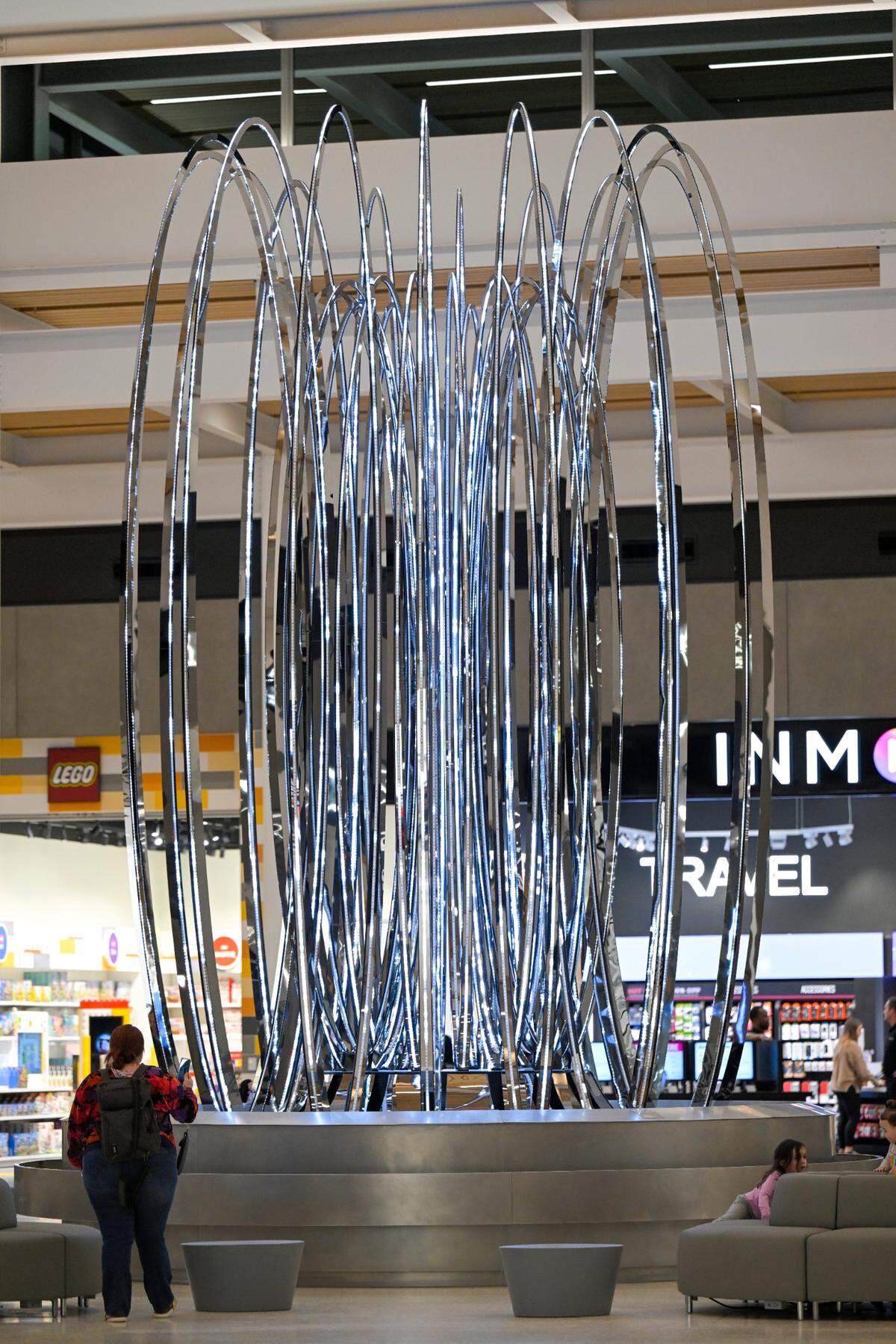 Travelers began departing and arriving from the new $1.5 billion single terminal at Kansas City International Airport which opened Tuesday, Feb. 28, 2023. A large sculpture greets visitors in the terminal.