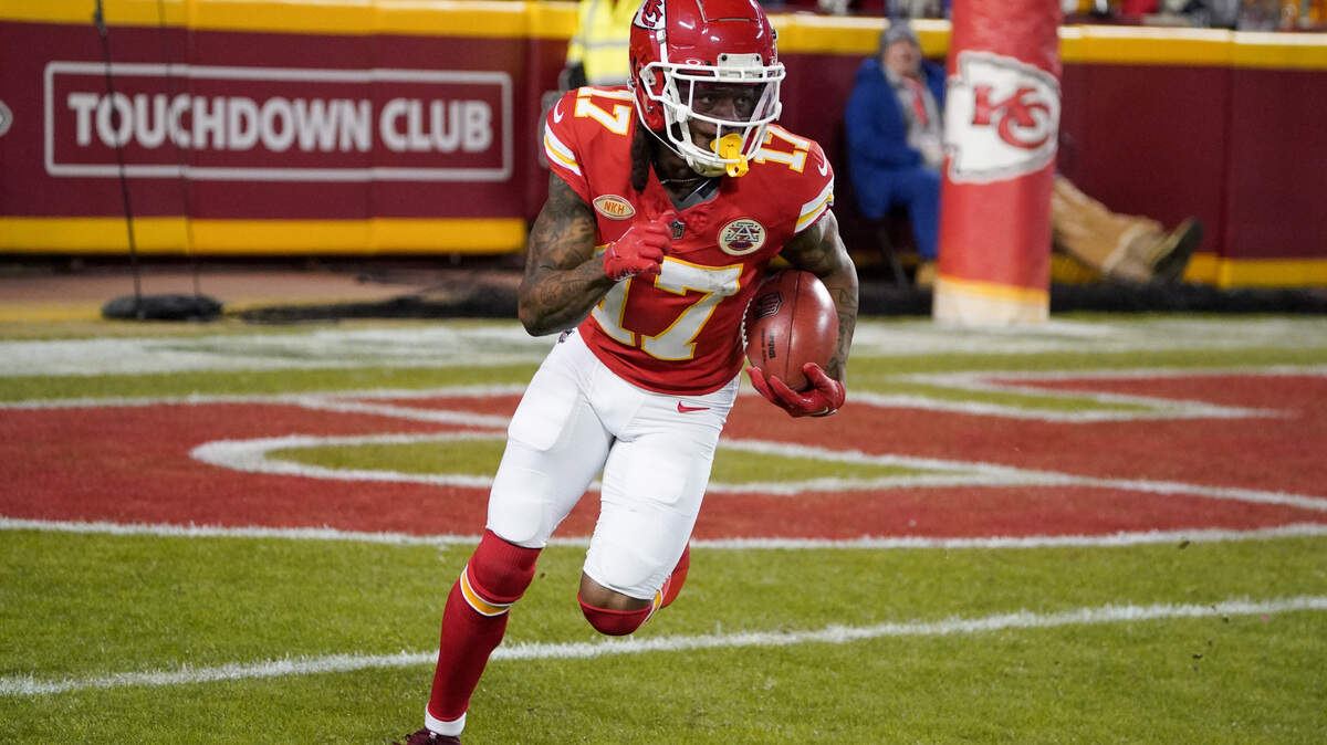 Kansas City Chiefs wide receiver Richie James (17) returns a kick against the Cincinnati Bengals during the second half at GEHA Field at Arrowhead Stadium.