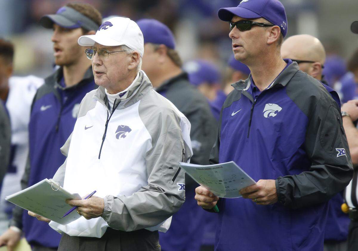 Bill Snyder, left, with son Sean, has taken K-State football to another level.