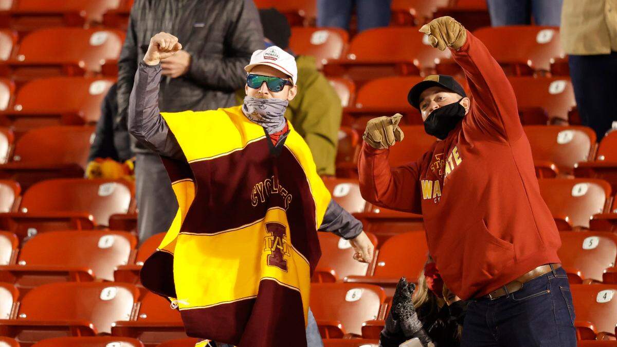 Fans cheer during the second half of an NCAA college football game between Iowa State and West Virginia, Saturday, Dec. 5, 2020, in Ames, Iowa. Iowa State won 42-6. (AP Photo/Matthew Putney)