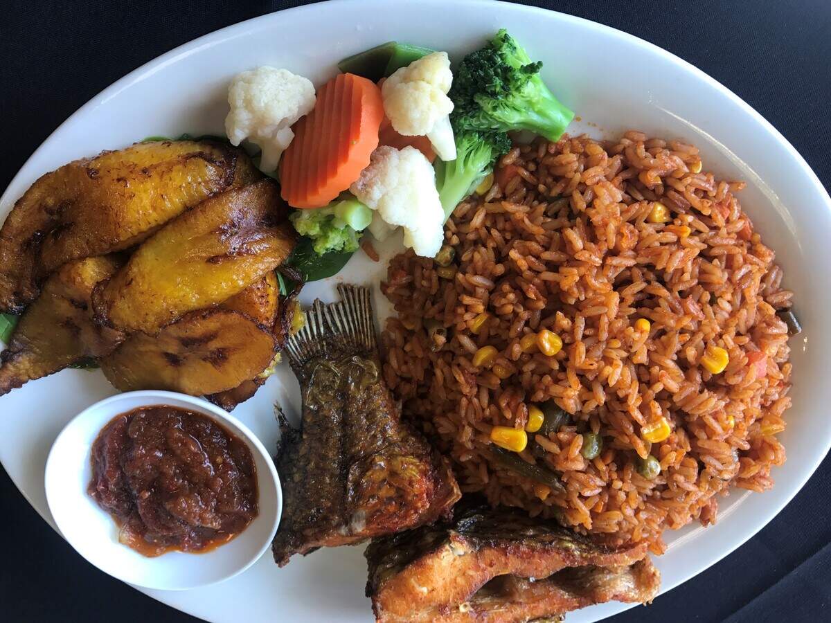 Fannie's Jollof rice with tilapia and plantains.