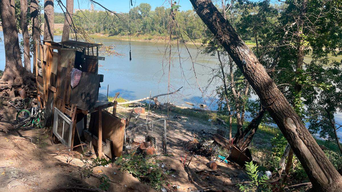 At a homeless camp on the edge of the Kansas River in Lawrence, many individuals lived in handmade structures before they were removed.