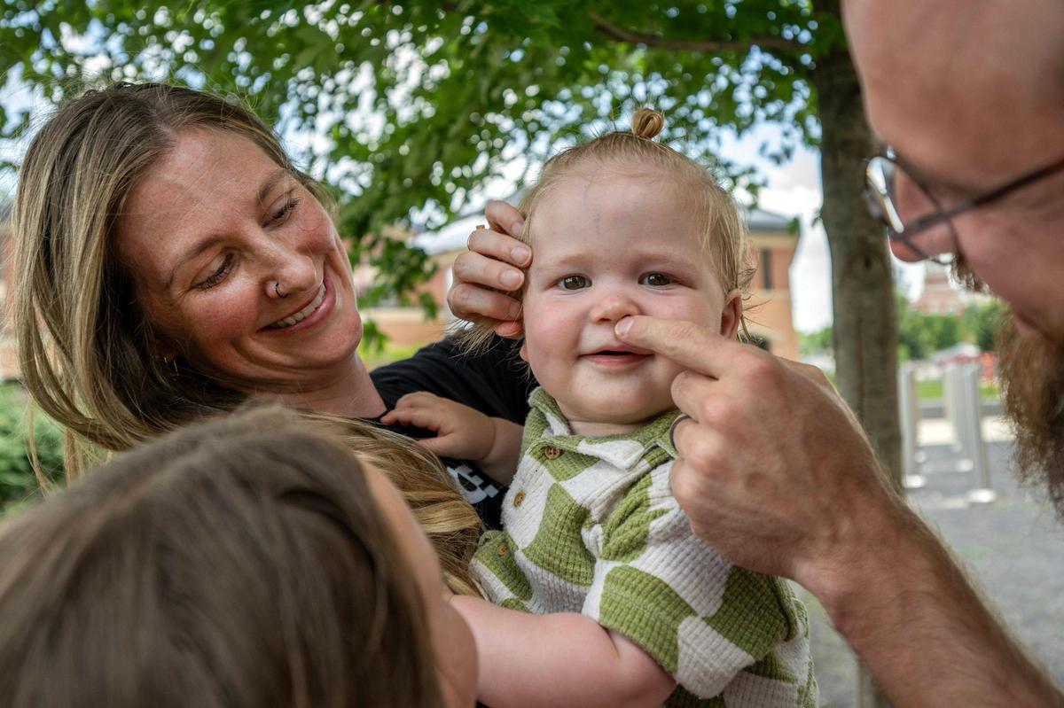 Sarah Goble holds her son Finnik.