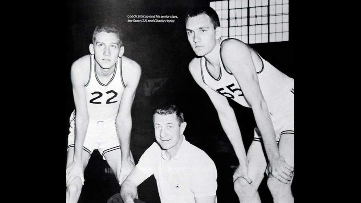 A page from an old Mizzou hoops program features Charles Henke, right, and teammate Joe Scott with coach Sparky Stallcop.