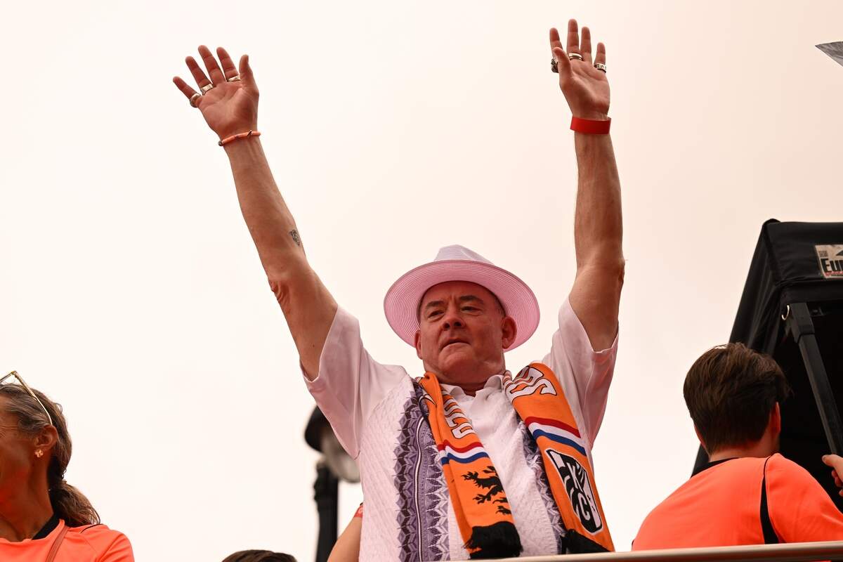 Comedian David Koechner rides on top of one of the Dutch ‘Oranje’ buses as part of the Netherlands Orange Walk from Kansas City’s Power & Light District to FIFA Fan Fest on June 25, 2026.