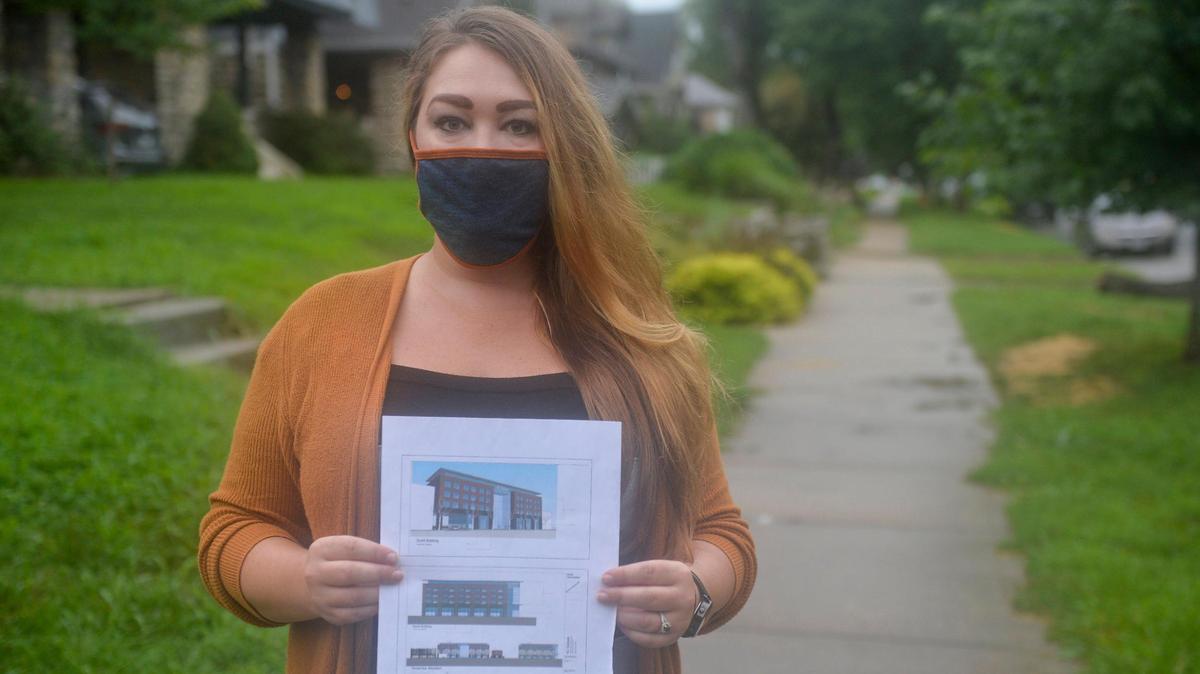 South Hyde Park neighborhood resident Sydney Anaya opposes Overland Park Councilman Faris Farassati’s development plan. She holds the plan outside of her home on Wednesday, July 29, 2020.