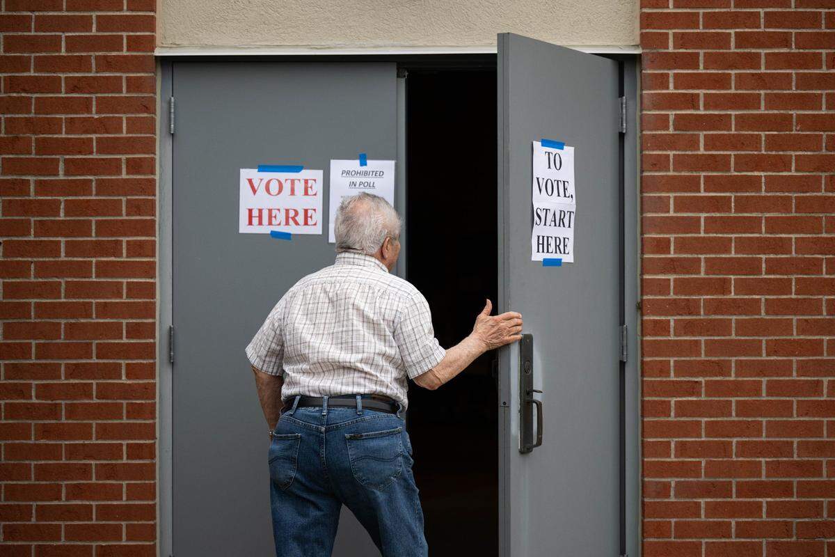 A voter heads in to cast his ballot for the Missouri primary election at the Midwest Genealogy Center on Tuesday, Aug. 6, 2024, in Independence.