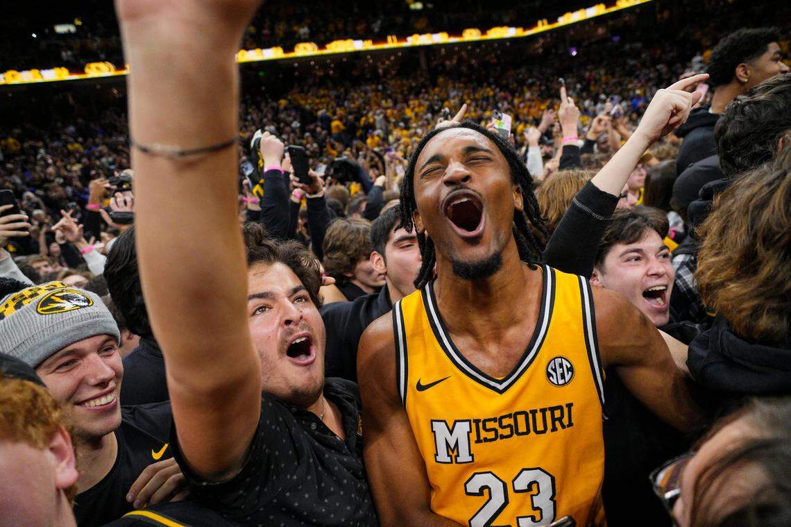 Missouri Tigers (and former Blue Valley) player Aidan Shaw celebrates with fans after MU’s defeat of the No. 1-ranked Kansas Jayhawks at Mizzou Arena in Columbia on Sunday, Dec 8, 2024.