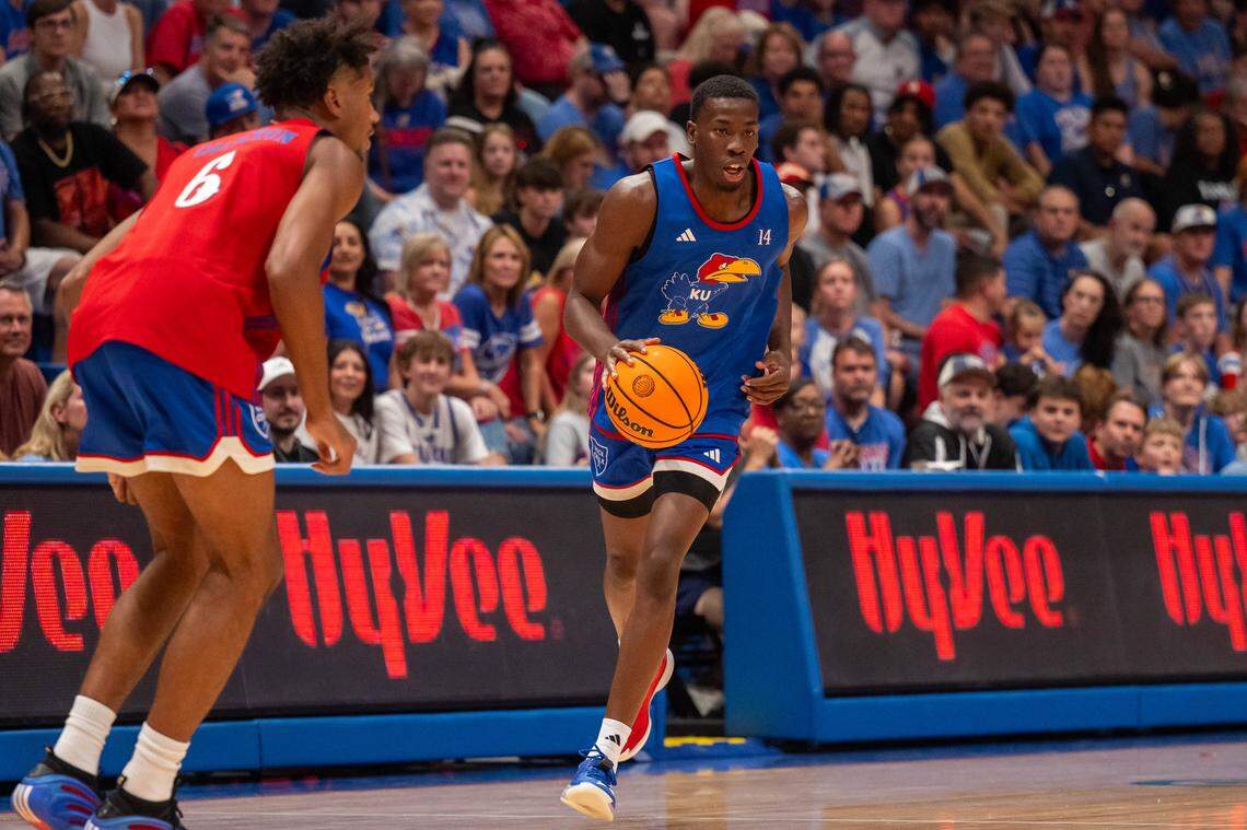Kansas Jayhawks guard Melvin Council Jr. dribbles the ball up the court during the men's scrimmage at Late Night in the Phog, on Friday, October 17, 2025, in Lawrence.
