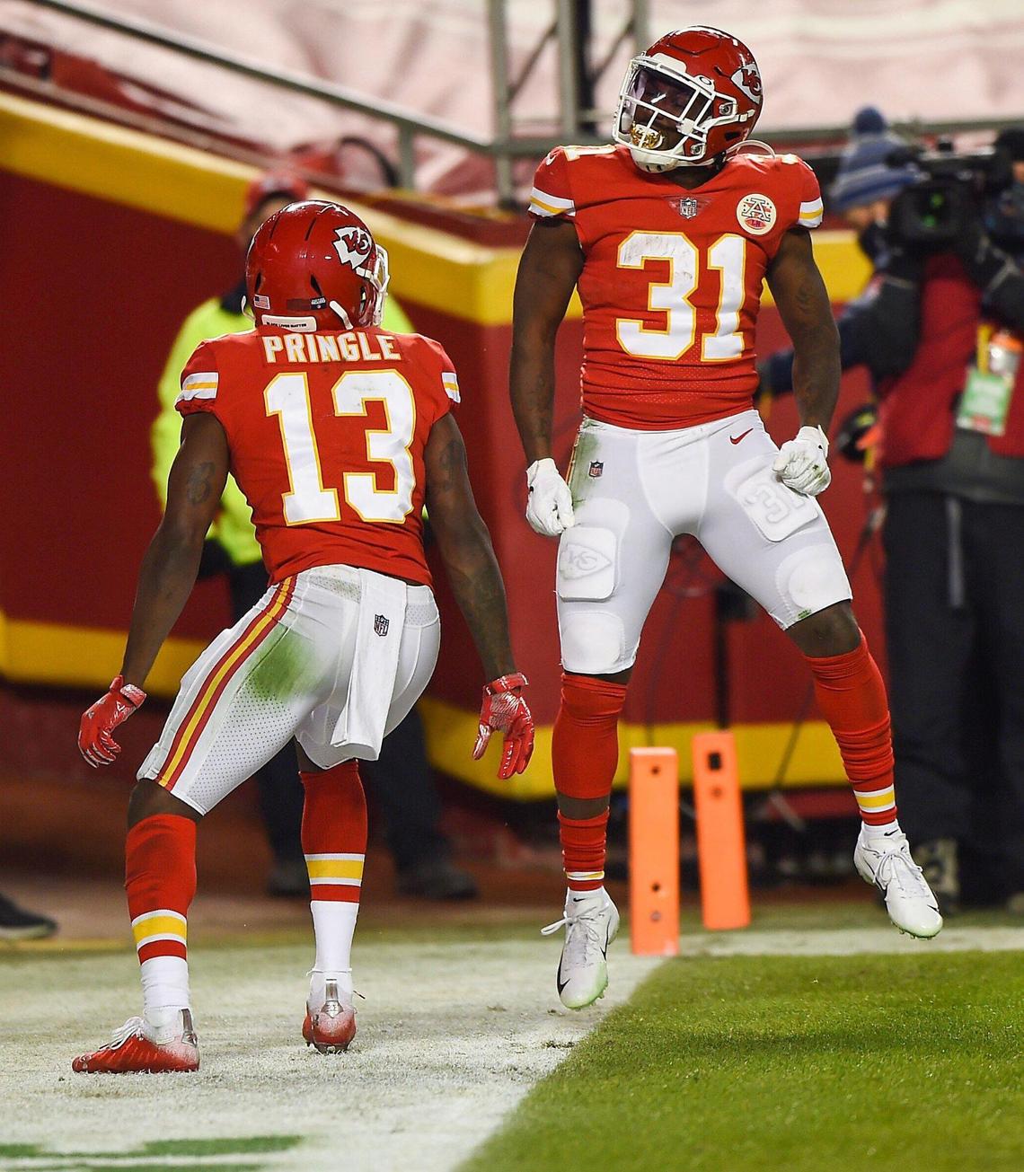 Kansas City Chiefs running back Darrel Williams celebrates his second quarter touchdown with wide receiver Byron Pringle Sunday, January 24, 2021, during the AFC Championship Game at Arrowhead Stadium in Kansas City, Missouri.