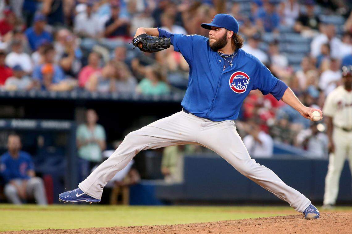 Chicago Cubs relief pitcher James Russell (40) delivers a pitch against the Atlanta Braves in the ninth inning at Turner Field on July 19, 2015. The Cubs won 4-1.