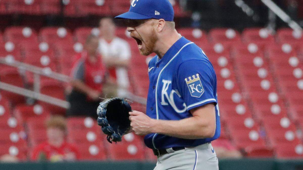 Kansas City Royals relief pitcher Richard Lovelady celebrates after finishing off the St. Louis Cardinals in the ninth inning of a baseball game, Sunday, Aug. 8, 2021, in St. Louis. (AP Photo/Tom Gannam)