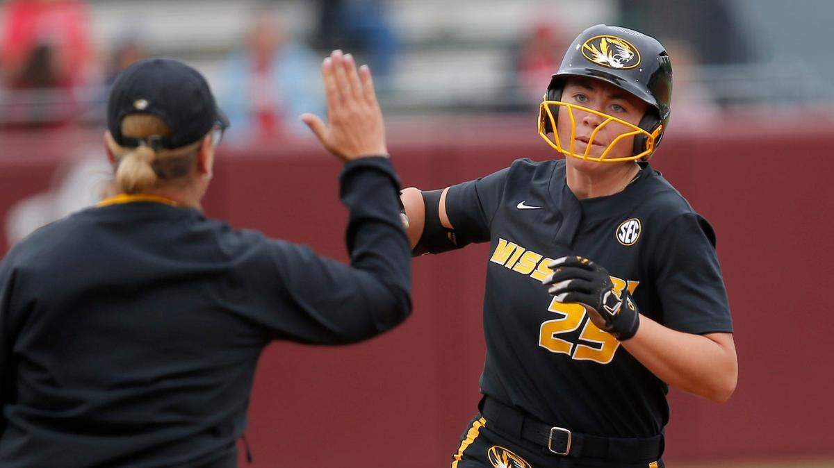 Missouri’s Alex Honnold (25) celebrates a home run during a college softball game against Cal at the Norman Regional of the NCAA softball tournament at Marita Hynes Field in Norman, Okla., on May 19, 2023.