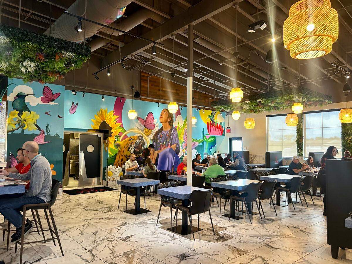 It-Ra Icons painted a mural inside Viva Tacos & Tequila.