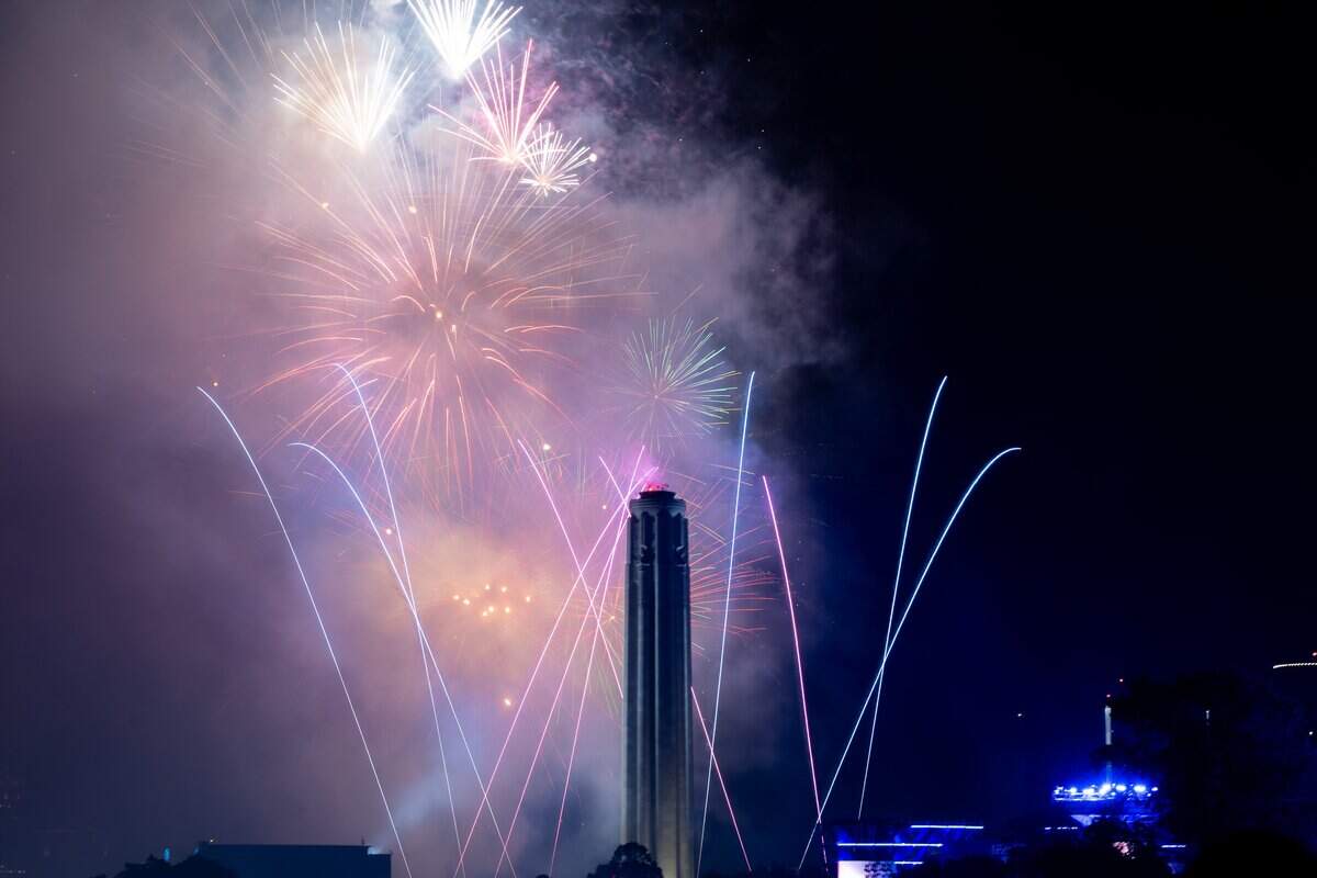 Fireworks light up the night sky over Penn Valley Park on Saturday, July 4, 2026. The National WWI Museum and Memorial's Stars and Stripes Picnic celebrates America's 250th and the Memorial's 100th