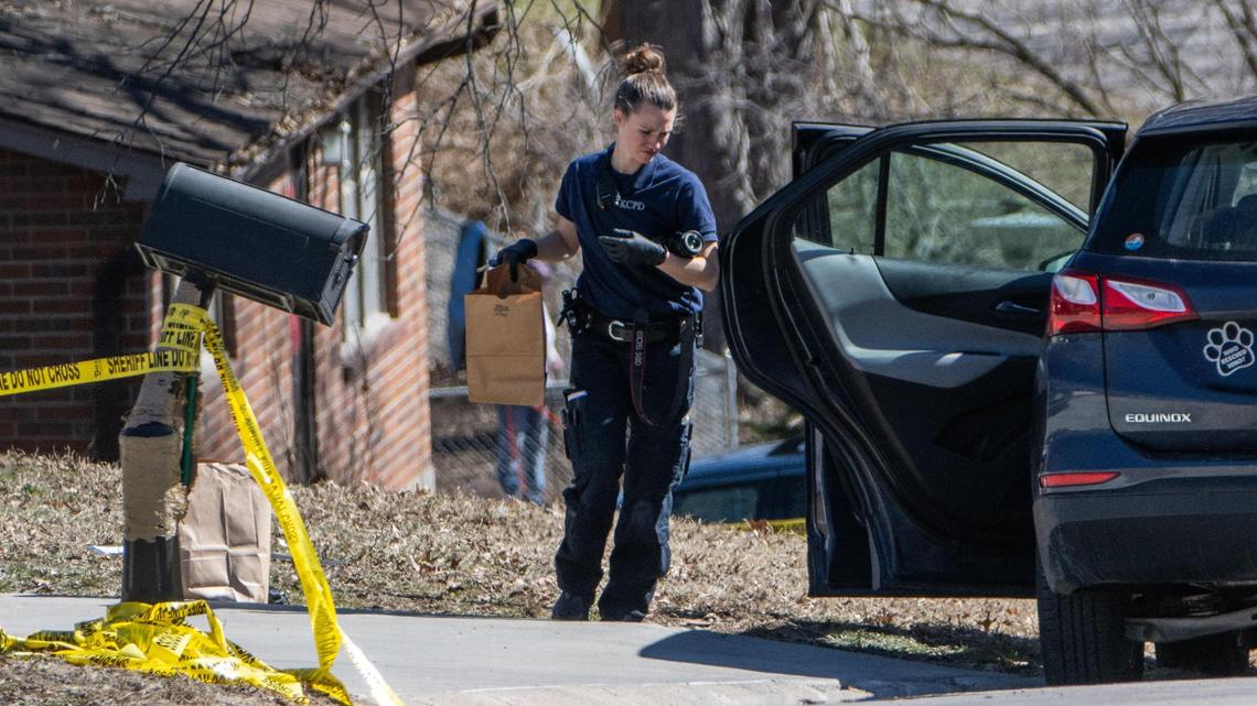 Police crime scene investigators search a vehicle outside of a home in Platte County where a child was abducted on Friday, Feb. 28, 2025.