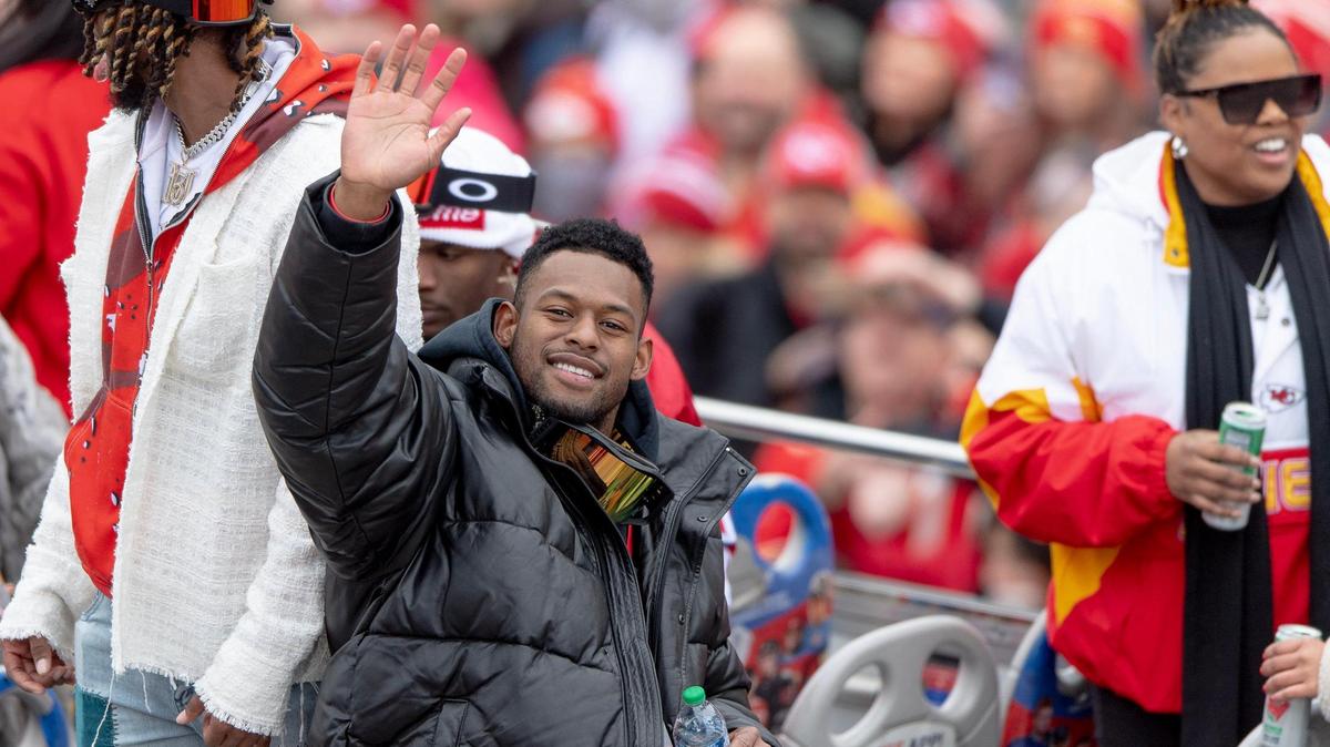Kansas City Chiefs wide receiver JuJu Smith-Schuster waves toward fans during the Kansas City Chiefs Super Bowl victory parade on Wednesday, Feb. 15, 2023, in Kansas City.
