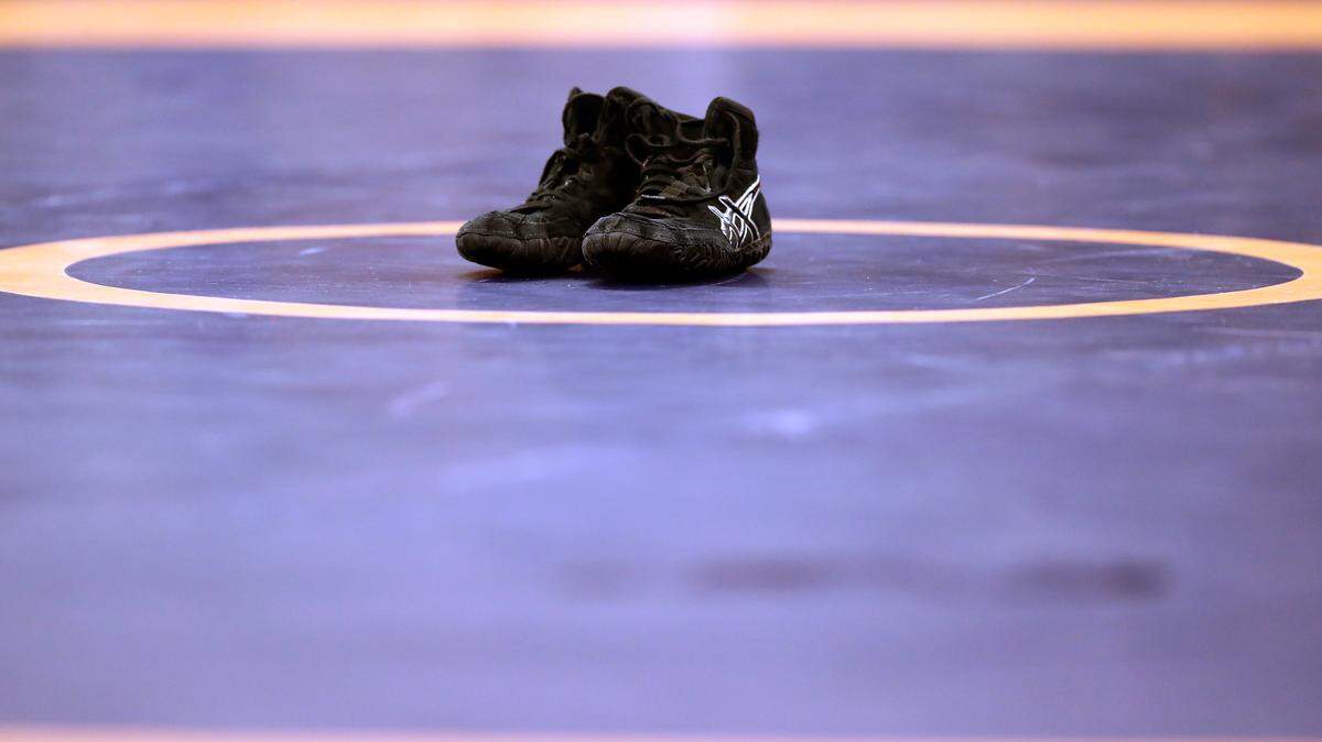 Shoes are seen on the mat during day 1 of the Olympic Team Wrestling Trials at Carver-Hawkeye Arena on April 9, 2016 in Iowa City, Iowa.