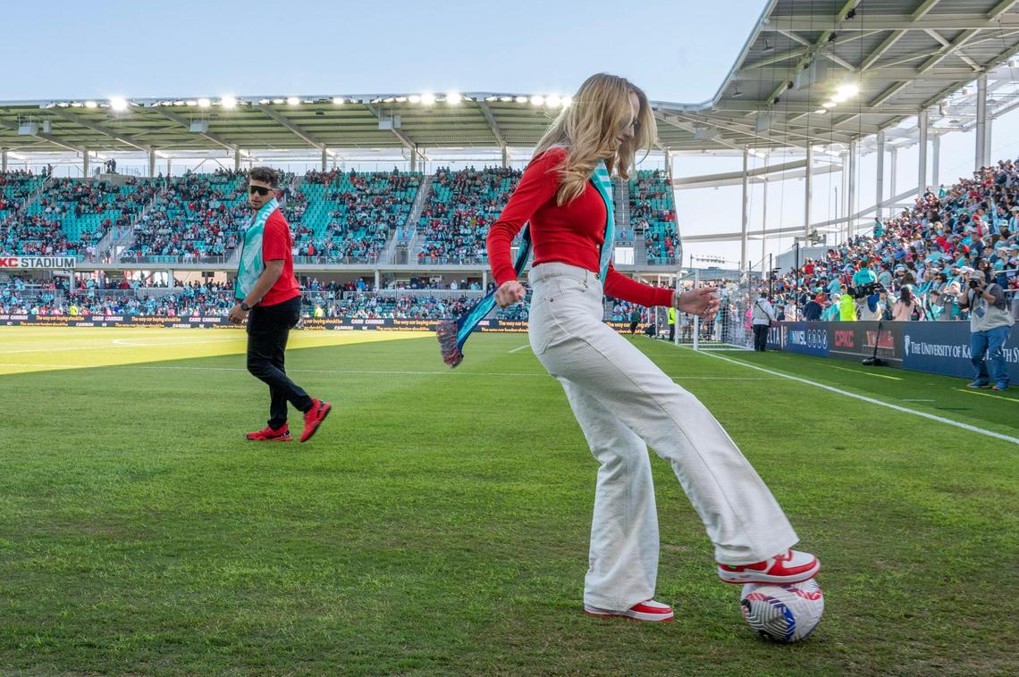 Kansas City Current co-owners Brittany Mahomes and Patrick Mahomes pass a soccer ball around on the field before the Current’s game against the Portland Thorns FC at CPKC Stadium on Saturday, March 16, 2024, in Kansas City.