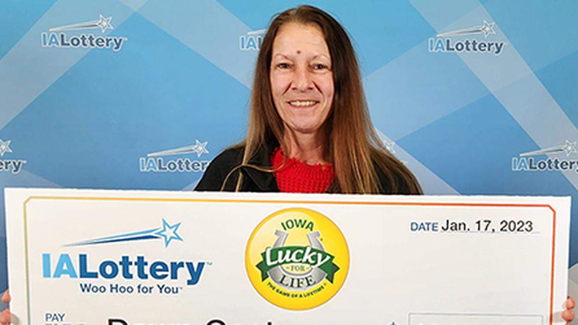 Dawn Costa, 57, with her Lucky for Life check.