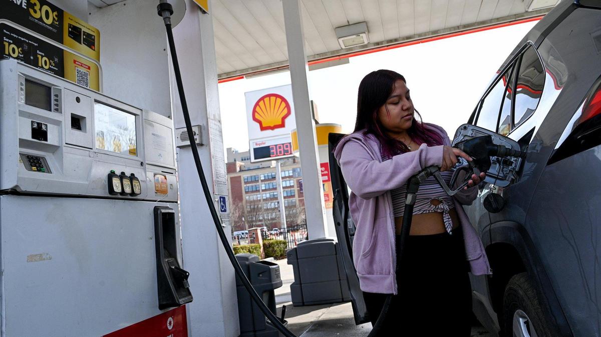 Before returning a rental car, Gloria Estrada of Kansas City filled its tank at the Shell station at Main Street and E. 38th Street Kansas City Tuesday, Mar. 8, 2022.