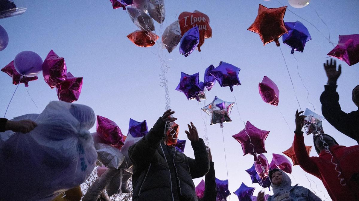 Family and friends pay tribute to Chelsea Williams by releasing balloons in her memory at Kaw Point Park on Friday, Dec. 29, 2023, in Kansas City. Williams, who was pregnant, was killed following a shooting the day after Christmas in Kansas City.