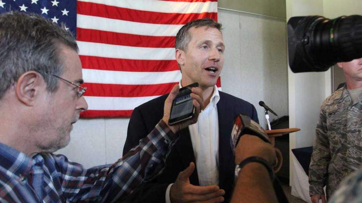 Missouri Gov. Eric Greitens has admitted he had an affair in 2015. But he denies he threatened to blackmail the woman involved to keep her silent.