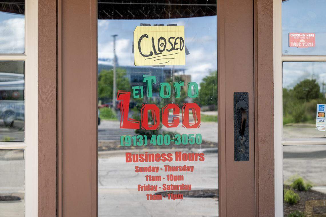A handwritten closed sign is taped to the main entrance door of El Toro Loco Mexican Bar & Grill on Wednesday, July 30, 2025, in Kansas City, Kansas.