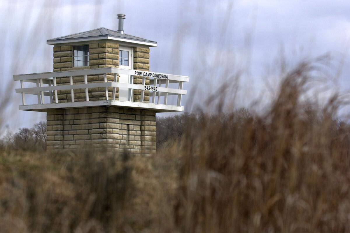 A stone guard tower marks Camp Concordia, which held more than 4,000 Germans and is where the POW Camp Concordia Museum opened in 2015.