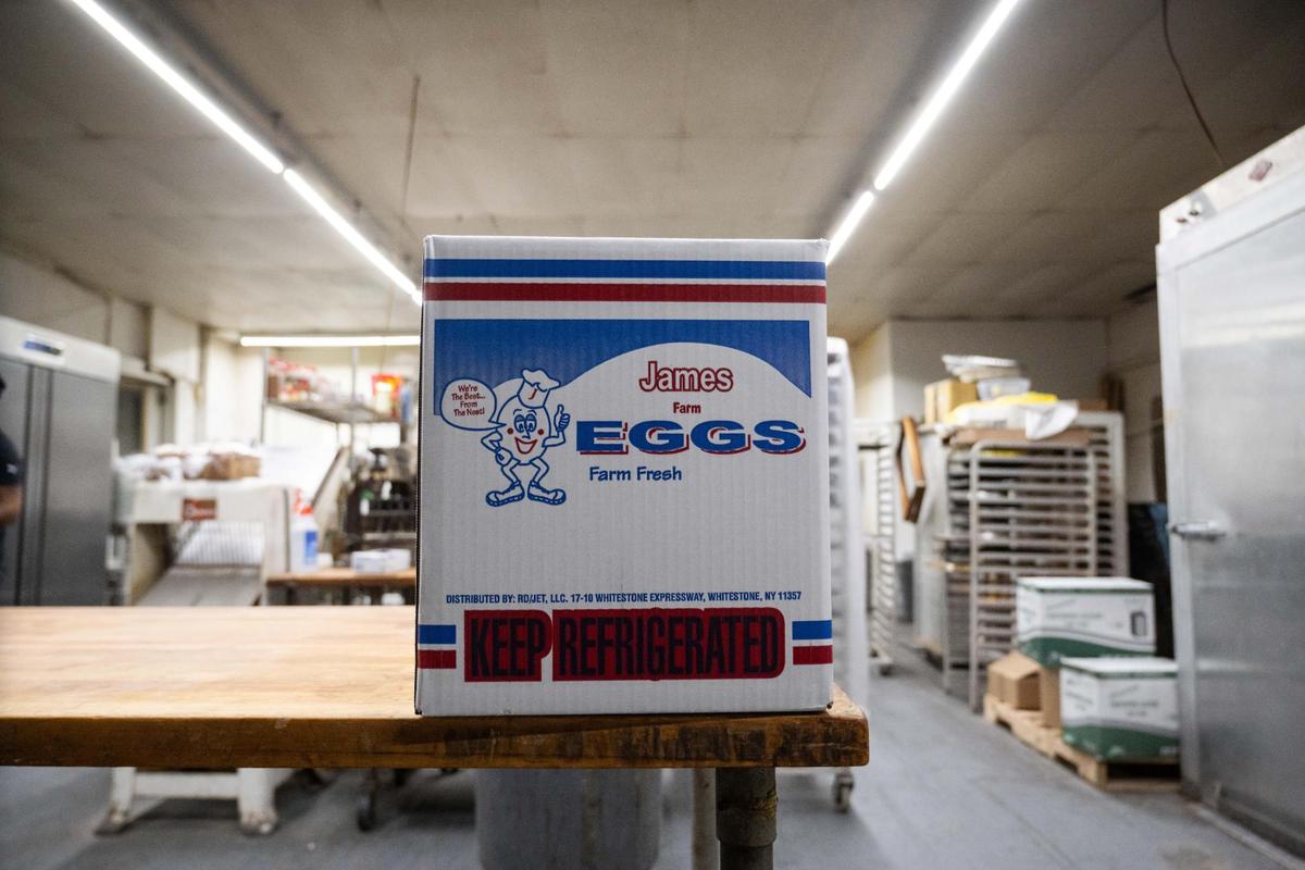 A case of eggs sits on a table at M&M Bakery and Delicatessen on Wednesday awaiting use in the bakery’s baked goods. Lead baker LaRon Williams says that the price for a case of eggs has nearly tripled over the last couple months.