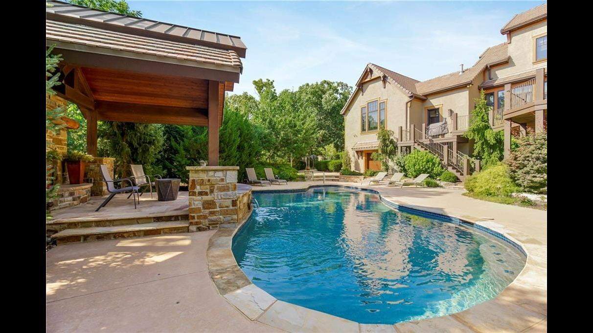 Mountain cabin vibes in Olathe? Inside $2.9M house with saltwater pool, 4 fireplaces
