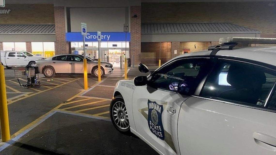 A man was fatally shot after charging a police officer in a Walmart store that had closed for the night, Indiana authorities said.