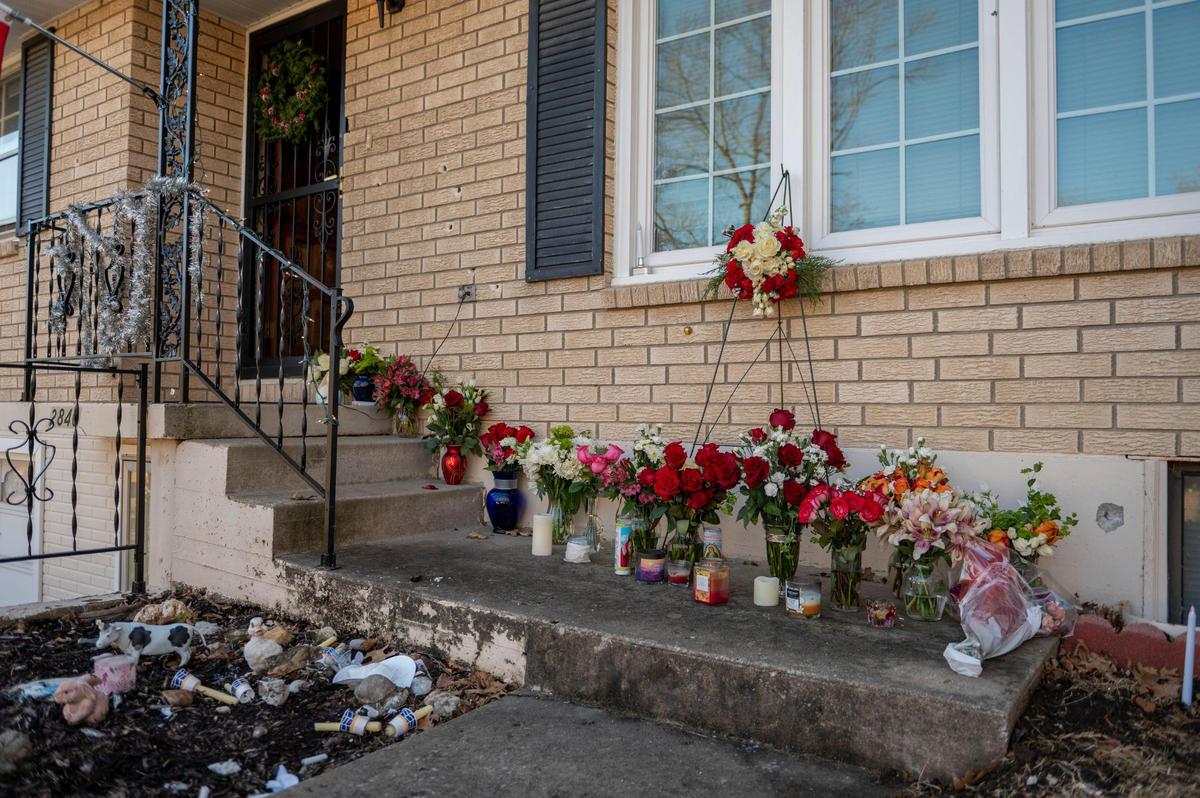 Flowers adorn the main entrance of the Panijanin’s home in Kansas City, Kan. on Tuesday, Dec 28, 2021.