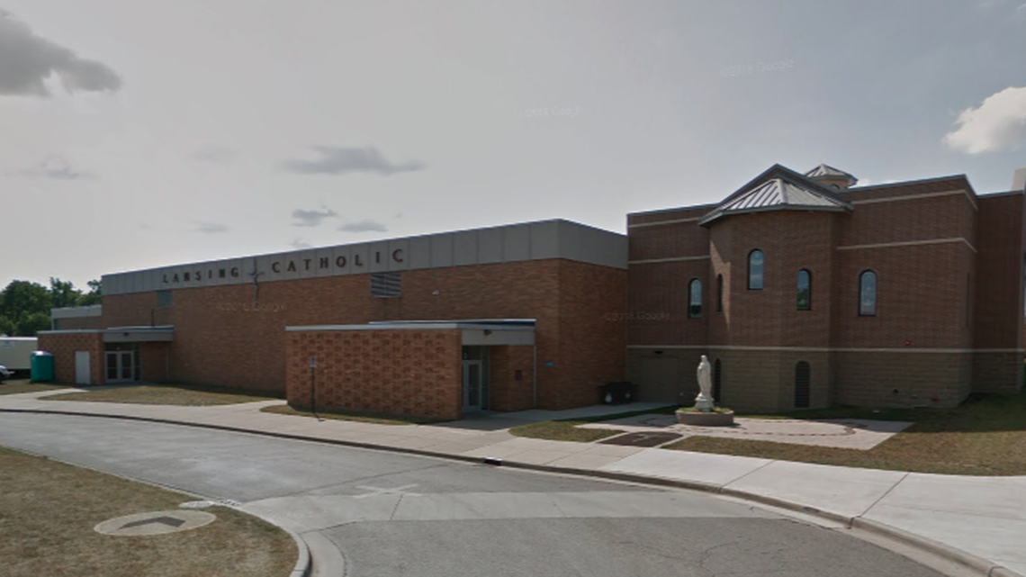 Lansing Catholic High School in Michigan shared a 1979 photo on social media Thursday of a student in a Ku Klux Klan outfit.