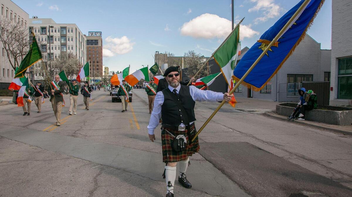 Flag bearers from the Ancient Order of Hibernians made their way south on Broadway Boulevard Sunday, March 17th, 2024, during the 50th annual St. Patrick’s Day parade.
