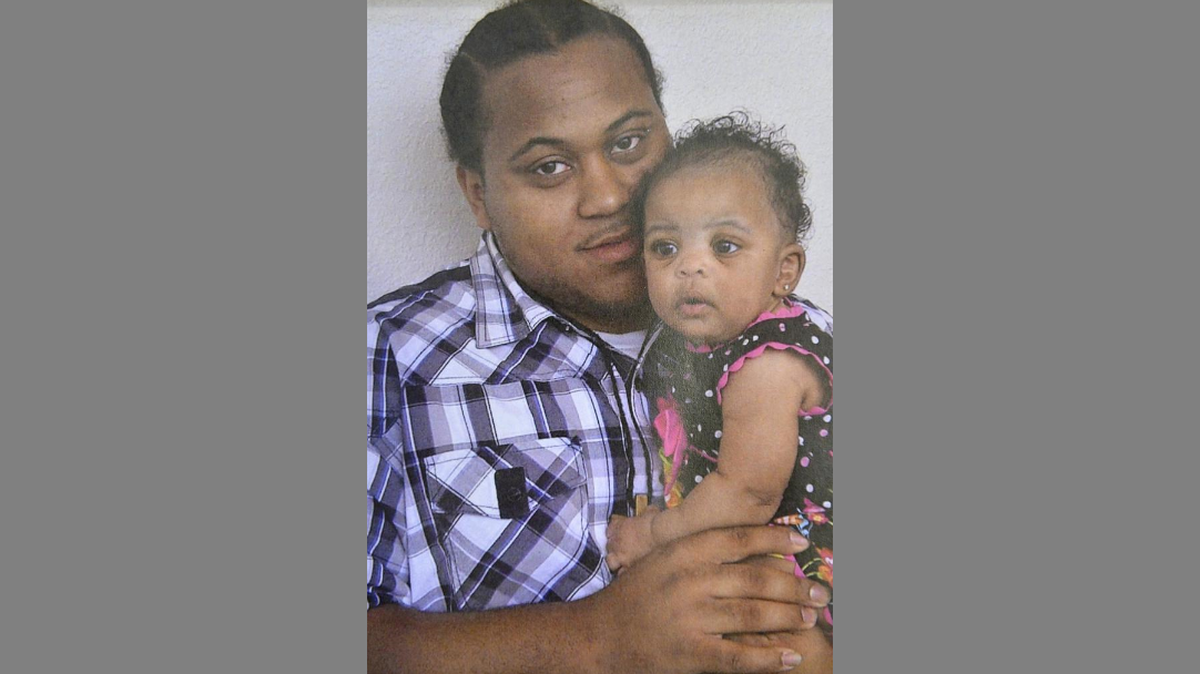 Ryan Stokes is pictured with his daughter, who was 1 year old at the time.