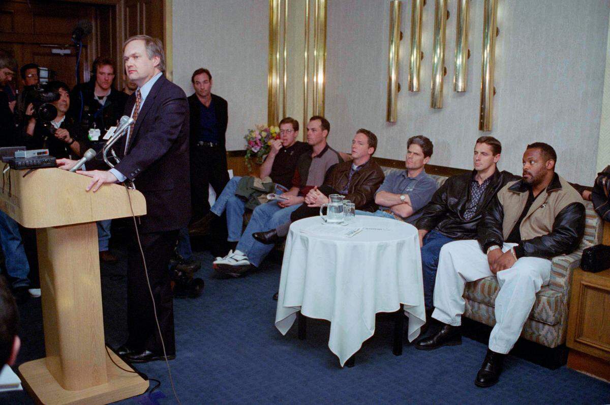 A group of major league baseball players sit and listen as their union head, Donald Fehr, left, speaks to reporters at a New York news conference on Friday, March 31, 1995. From right are: Detroit Tigers first baseman Cecil Fielder, unidentified Los Angeles Dodgers outfielder Brett Butler, Kansas City Royals pitcher David Cone, Toronto Blue Jays third baseman Ed Sprague, free agent Orel Hershiser, and Paul Moliter of the Toronto Blue Jays, standing. Baseball players ended their 232-day strike on Friday, when a federal judge ruled against the owners in the labor dispute and the union said ?real baseball? could resume quickly if there is no lockout. (AP Photo/Paul Hurschmann)