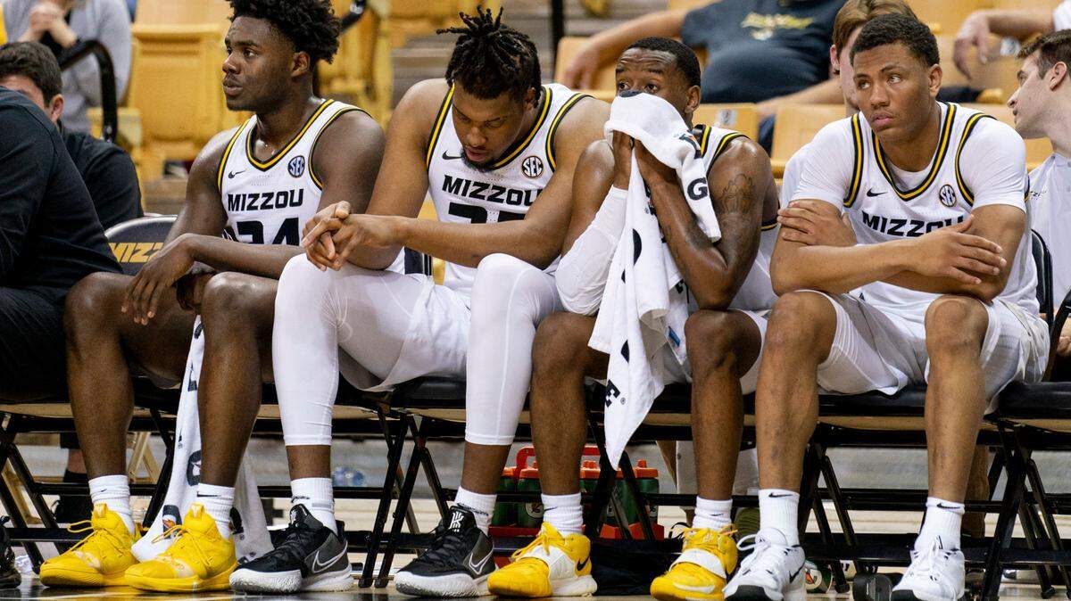 Missouri’s Kobe Brown, from left, Jordan Wilmore, Amari Davis, Javon Pickett sit on the bench late in the second half of an NCAA college basketball game against Kansas City Monday, Nov. 15, 2021, in Columbia, Mo. Kansas City won 80-66. (AP Photo/L.G. Patterson)