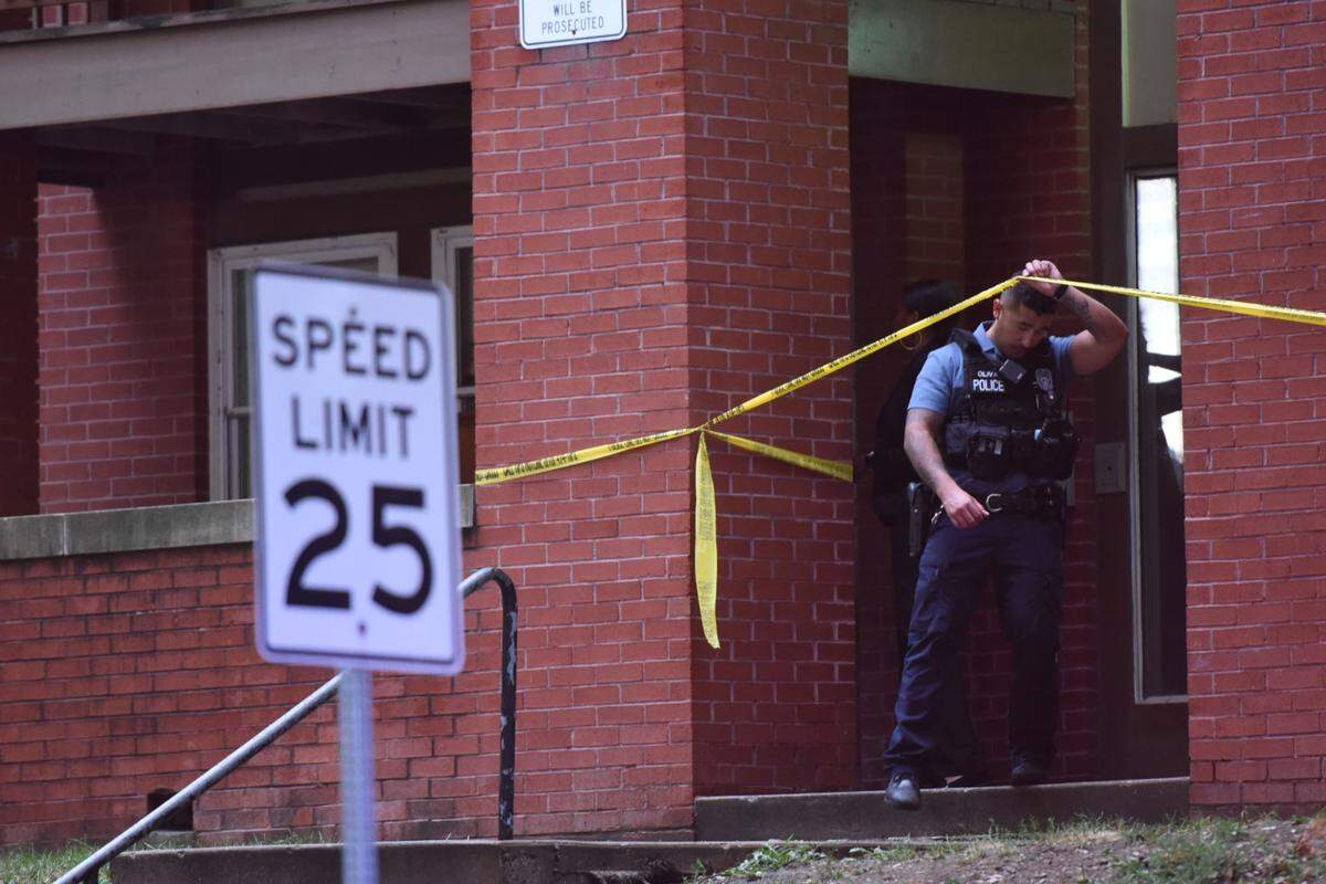 Kansas City police investigate a homicide inside an apartment complex in the 2600 block of East 29th Street on Sunday, July 24, 2022.