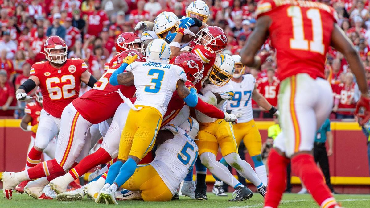 Kansas City Chiefs tight end Travis Kelce (87) eyes the goal line as his offensive line pushes him over for a touchdown against the Los Angeles Chargers during an NFL football game at GEHA Field at Arrowhead Stadium on Sunday, Oct. 22, 2023, in Kansas City.