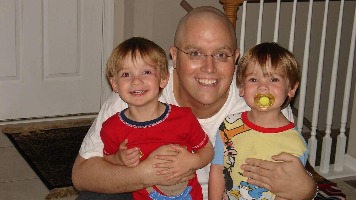 Bradley Woodworth is pictured in a photo published by The Star in 2009, with twin sons then 3 and a half years old.