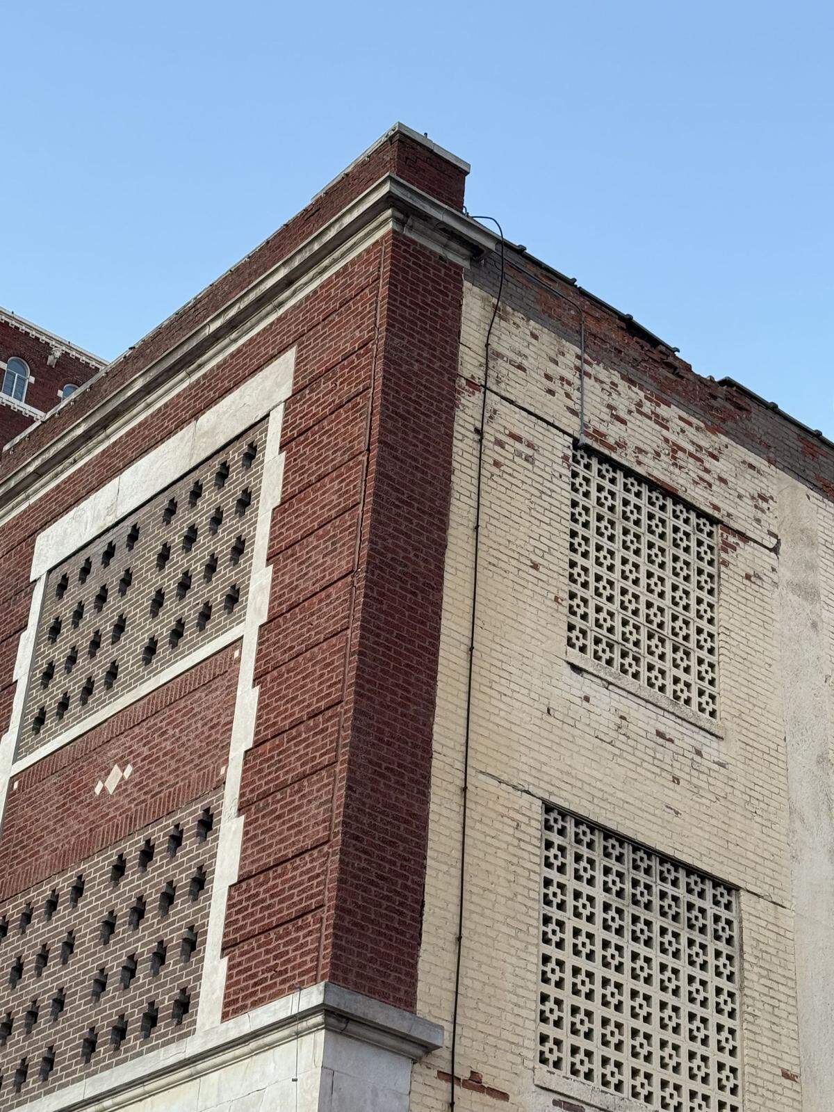 Wyandotte Street, between 12th and 13th streets, were closed after parts of the facade of a parking garage at 1219 Wyandotte Street separated from the building, sending bricks crashing to the sidewalk and street below, according to a spokesman with the Kansas City Fire Department.