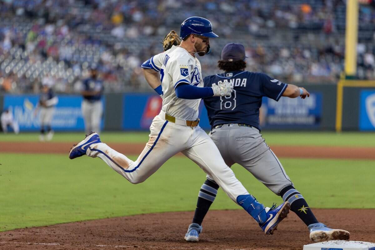 Infielder Nick Loftin, #12, sprints to first base during Thursday's Armed Forces Night game at Kauffman Stadium on July 2, 2026. The Tampa Bay Rays came out on top over the Royals with a final score of 5 to 2.