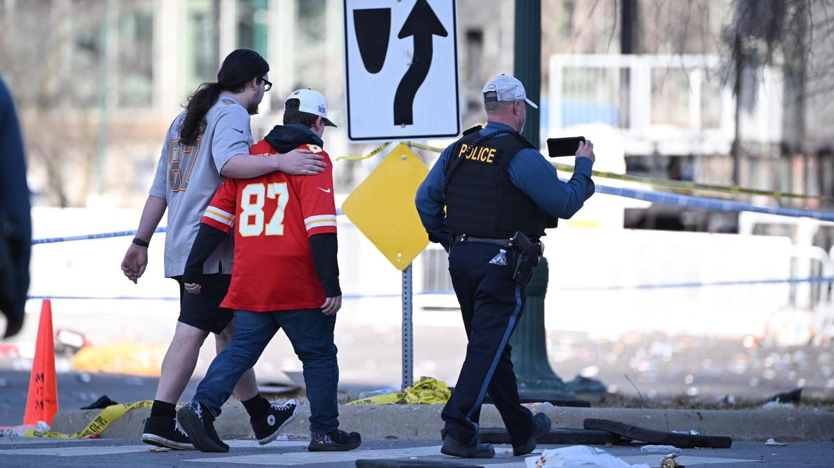Chiefs fans leave the Union Station area after a shooting there at the end of the Kansas City Chiefs Super Bowl LVIII victory parade Wednesday, Feb. 14, 2024, in Kansas City.