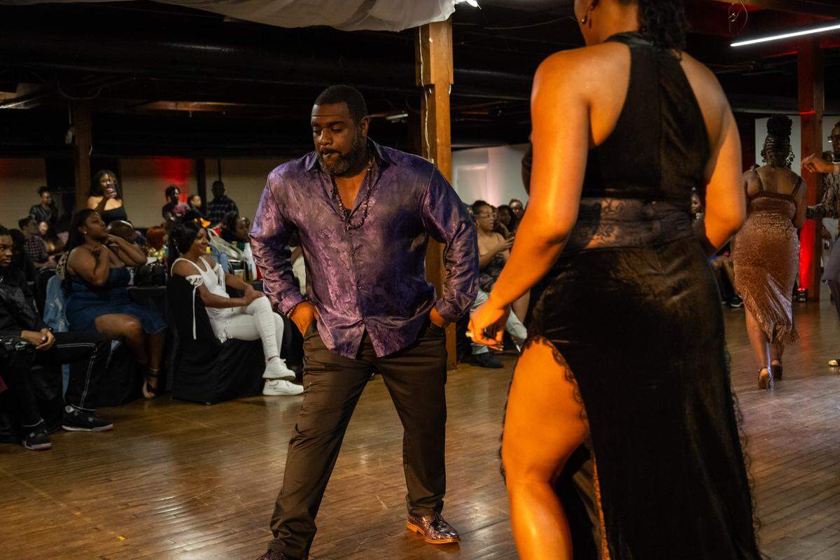 Rafael and Deneane Hancock do the “Kansas City Two-Step” at The Big StepOff 2025, on Oct.18, 2025, in Kansas City. The Hancocks captured first place in the annual competition. Midway through their routine, the couple amazed the crowd with a c-walk, showcasing intricate footwork and heel clicks.