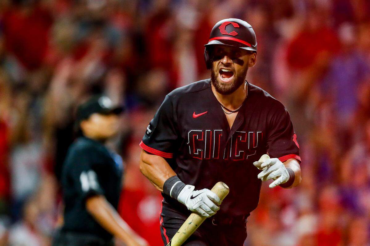 Former Reds right fielder Hunter Renfroe liked the look of his solo home run during a game against the Chicago Cubs this season at Great American Ball Park in Cincinnati.