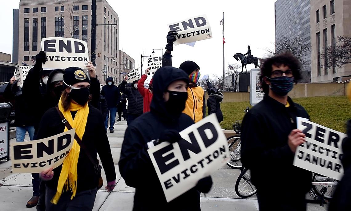 Protesters with KC Tenants march to the doors of the Jackson County Courthouse in downtown Kansas City. They barricaded the building in an effort to get the circuit court to halt evictions during the COVID-19 pandemic.